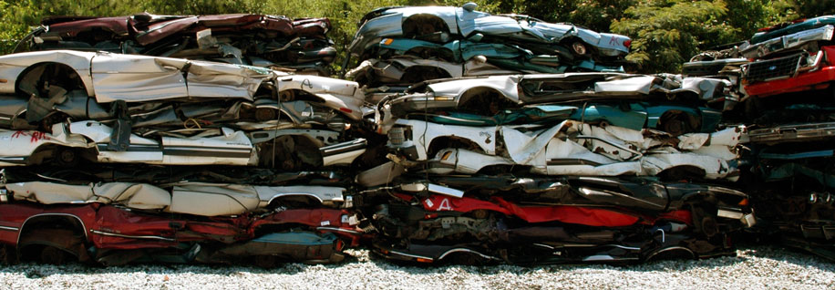 Scrap cars crushed and stacked.